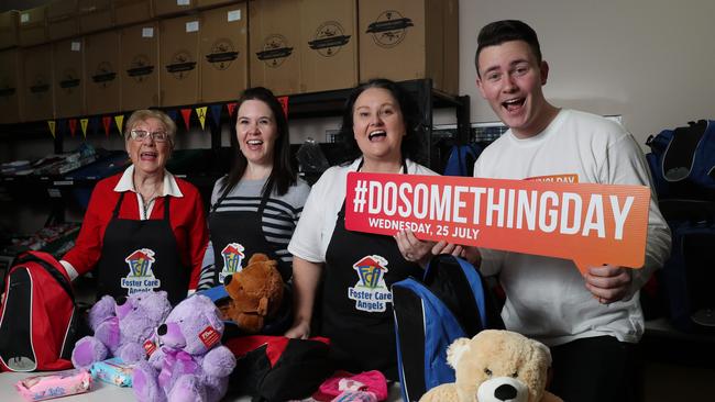 Joy Jones, Rebecca Ristic, Kelly Doyle and journalist Jake McCallum pose for a photo at Foster Care Angels in Castle Hill today for DoSomething Day 2018. Pic: AAP Image/David Swift