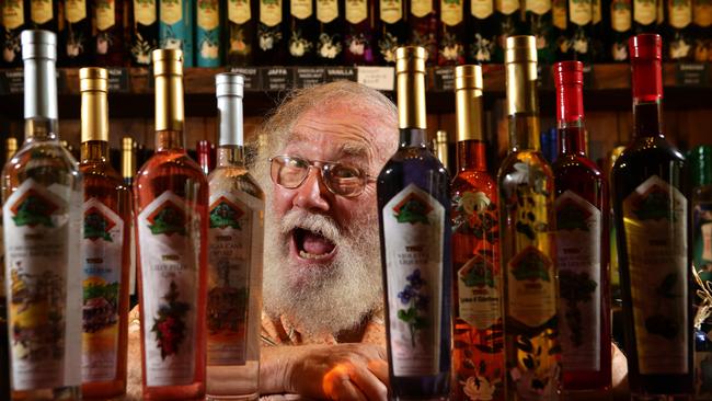 Founder Michael Ward with a range of his spirits. Photo: Adam Head 