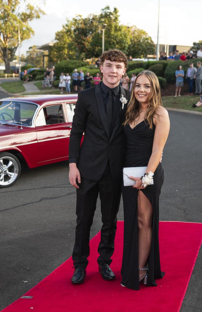 Graduate Aidan Lipp and partner Jess Carnell arrive at Mary MacKillop Catholic College formal at Highfields Cultural Centre, Thursday, November 14, 2024. Picture: Kevin Farmer