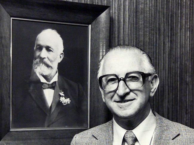 Gordon Hoadley with a painting of Abel Hoadley, the inventor of the Violet Crumble bar.