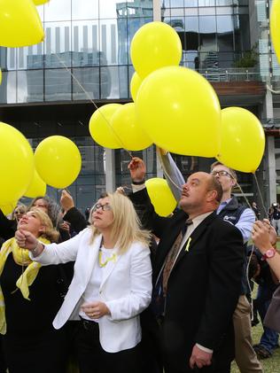 Family and friends of Allison Baden-Clay release yellow balloons to celebrate the guilty verdict of Gerard Baden-Clay murder trial. Pic Darren England.