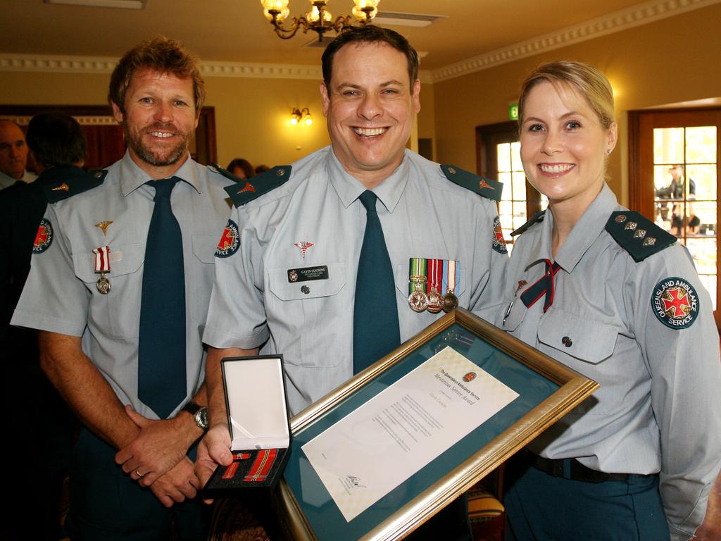 Brad Norris, Gavin Cousens and Jenni Cousens at the QAS Meritorious Service Awards at Kershaw House, Rockhampton. Photo: Sharyn O'Neill