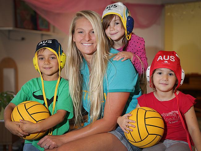 Jack, Alice and Sophia from Tigger's Honey Pot Childcare Centre in Randwick with Aussie Stingers Water Polo player and Rio Olympian Lea Yanitsas.