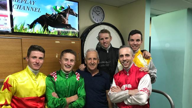 James McDonald (yellow), Tom Marquand (green), Chris Barret (centre, black shirt), Tommy Berry (behind in black), Brenton Avdulla (red silks, white sleeve), Tim Clark (behind in yellow).