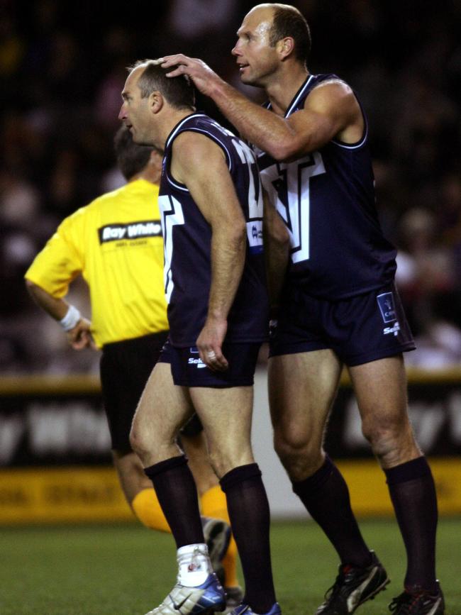 Stewart Loewe and Simon Goosey in an EJ Whitten Legends game.