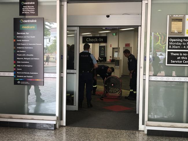 Fire and rescue NSW crews used industrial fans to try and dry out the carpets. Picture: Madeline Crittenden.