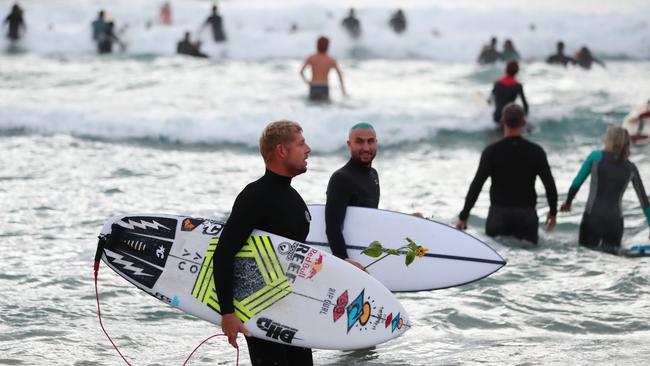 GOLD COAST, AUSTRALIA - JULY 11: Surfer Mick Fanning attends a paddle out in memory of Alex 'Chumpy' Pullin on July 11, 2020 in Gold Coast, Australia. Australian Winter Olympic Games Snowboarder Alex 'Chumpy' Pullin died on Wednesday 8 July in a drowning accident while spearfishing at Palm Beach on the Gold Coast, aged 32. (Photo by Chris Hyde/Getty Images)