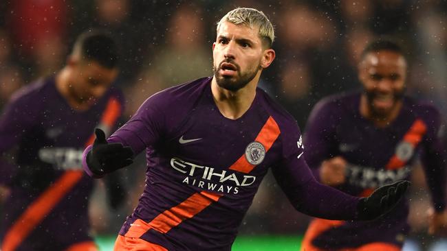Sergio Aguero of Manchester City celebrates his team's second goal which rebounded off Kristoffer Nordfeldt of Swansea City for an own goal. Picture: Getty Images