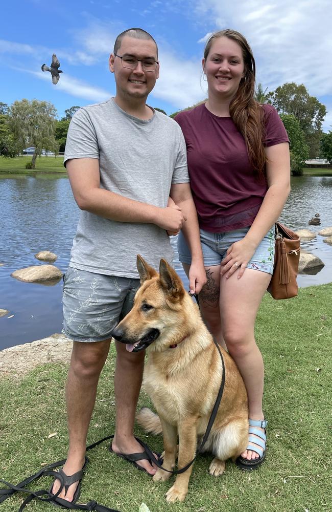 Matthew Randle, fiance Lauren Gary and their dog Jager at Centenary Lakes Park, Caboolture. Picture: Aaron Goodwin