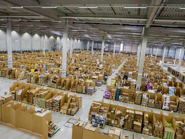 Boxes sit stacked in bays ahead of shipping from an Amazon warehouse. Picture: Martin Leissl/Bloomberg