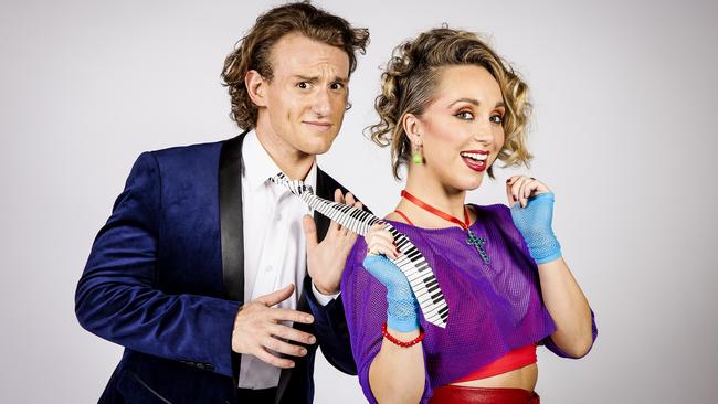 Christian Charisiou as Robbie Hart and Nadia Komazec as Holly in the Australian production of The Wedding Singer musical. Picture: Nicole Cleary