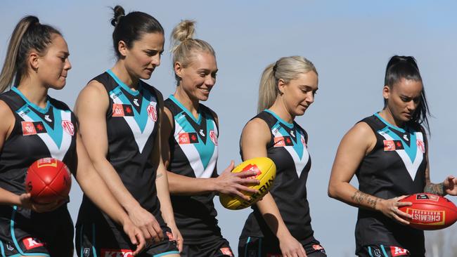 AFLW Team leaders from left Justine Miles, Angela Foley (VC), Erin Phillips (C), Hannah Dunn and Gemma Houghton on the field at Alberton Oval. Picture: Emma Brasier