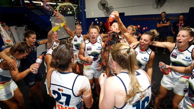 Crows players sing the team song after beating Carlton. Picture: Adam Trafford/AFL Media/Getty Images