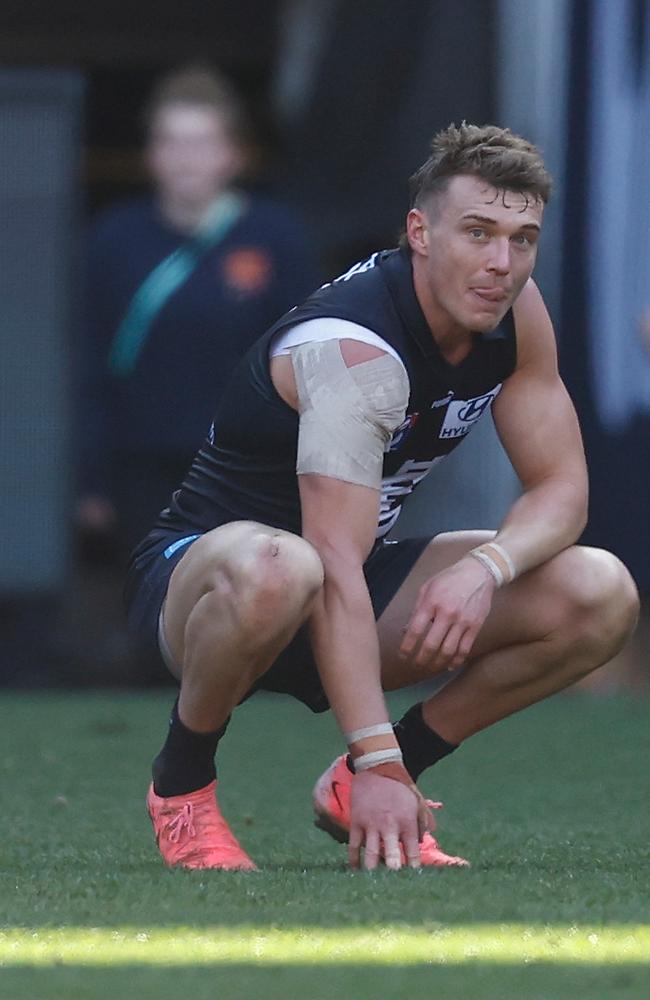 Patrick Cripps on his haunches after the final siren. Picture: Michael Willson/AFL Photos via Getty Images.