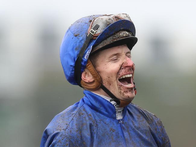 SYDNEY, AUSTRALIA - APRIL 20: James McDonald riding Broadsiding returns to scale after winning Race 7 The Moet & Chandon Champagne Stakes during Sydney Racing at Royal Randwick Racecourse on April 20, 2024 in Sydney, Australia. (Photo by Jason McCawley/Getty Images)