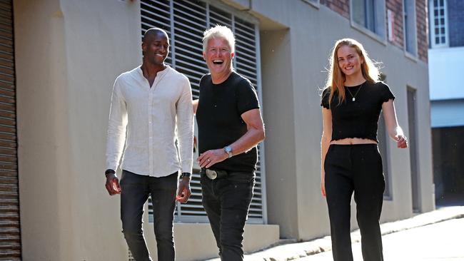 Chadwick Models owner Martin Chadwick (C) with models Chloe Wynne and Cedric Folly. Picture: Toby Zerna