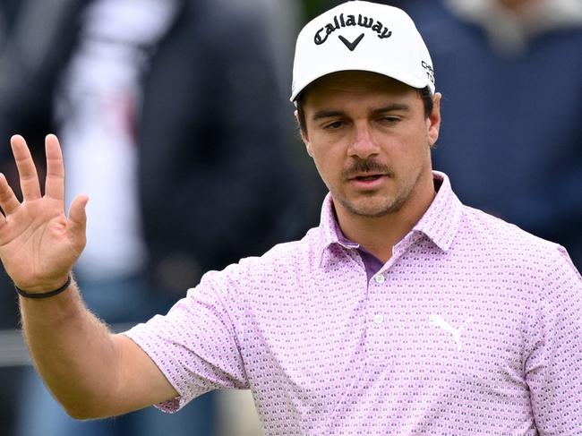 MUNICH, GERMANY - JULY 07: David Micheluzzi of Australia acknowledge the crowd after playing his putt shot on 11th during day four of the BMW International Open at Golfclub Munchen Eichenried on July 07, 2024 in Munich, Germany. (Photo by Stuart Franklin/Getty Images)