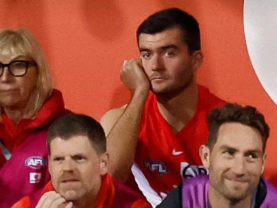 SYDNEY, AUSTRALIA - SEPTEMBER 20: Logan McDonald of the Swans looks on from the bench during the 2024 AFL First Preliminary Final match between the Sydney Swans and the Port Adelaide Power at The Sydney Cricket Ground on September 20, 2024 in Sydney, Australia. (Photo by Michael Willson/AFL Photos via Getty Images)