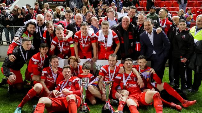 Campbelltown City players celebrate after winning the 2018 men's Premier League soccer grand final. Picture: Adam Butler