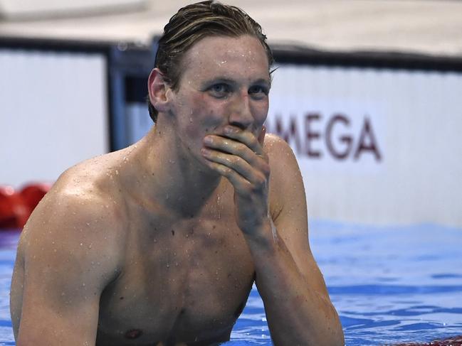 Australia's Mack Horton reacts after he won the Men's 400m Freestyle Final during the swimming event at the Rio 2016 Olympic Games at the Olympic Aquatics Stadium in Rio de Janeiro on August 6, 2016. / AFP PHOTO / CHRISTOPHE SIMON