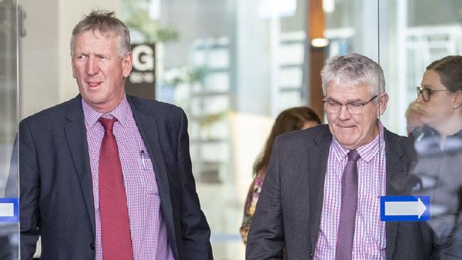 Denis and Neil Wagner leave court during the Brisbane portion of the hearing.