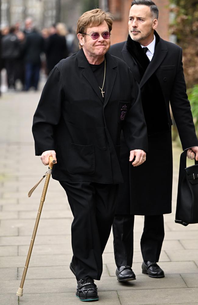 John and husband David Furnish in February this year. Picture: Jeff Spicer/Getty Images