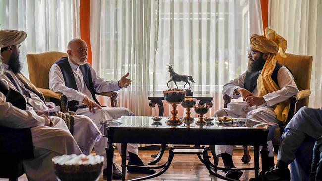 A Taliban delegation led by the head of the negotiating team Anas Haqqani (centre right) meeting with former Afghan government officials including former president Hamid Karzai. Picture: Islamic Emirate of Afghanistan/AFP