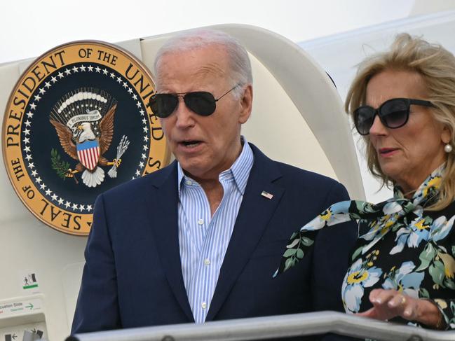US President Joe Biden and First Lady Jill Biden step off Air Force One upon arrival at McGuire Air Force Base in New Jersey on June 29, 2024. Biden is in New Jersey for campaign fundraisers. (Photo by Mandel NGAN / AFP)