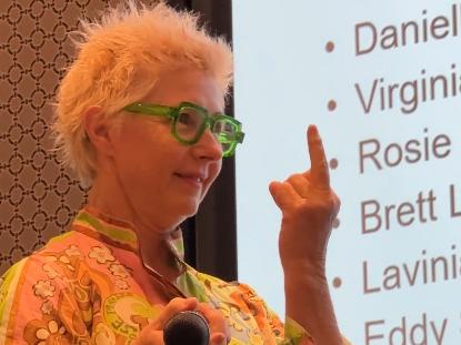 Gold Coast mayoral candidate Danielle Dunsmore gives the finger during a central chamber of commerce debate at the Mantra on View, Surfers Paradise on February 28, 2024