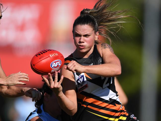 Anne Hatchard of NT Thunder gets a handball away during the VFLW Round 9 match against Carlton. Picture: Felicity Elliott/AFLNT Media.