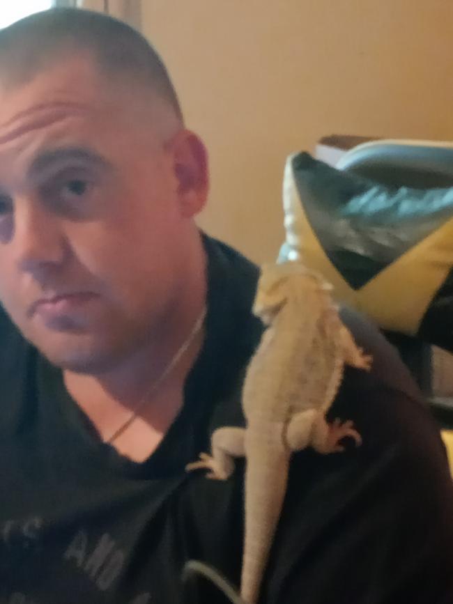 Benjamin Hickey with his bearded dragon Spyke. Picture: Supplied by family