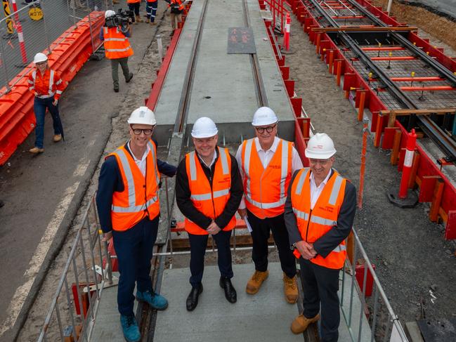 The first tracks have been laid for the Gold Coast light rail stage 3 extension from Broadbeach to Burleigh Heads. L-R are Queensland Transport Minister Bart Mellish, Senator Murray Watt, John Witheriff and Rob Evans. Pictures taken at Miami near Kedron Ave. Picture: TMR