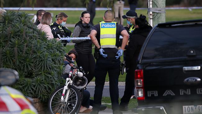 Police at the scene in Gladstone Park. Picture: Ian Currie