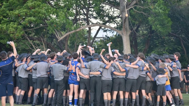 Marist College Ashgrove supporters celebrate a win.