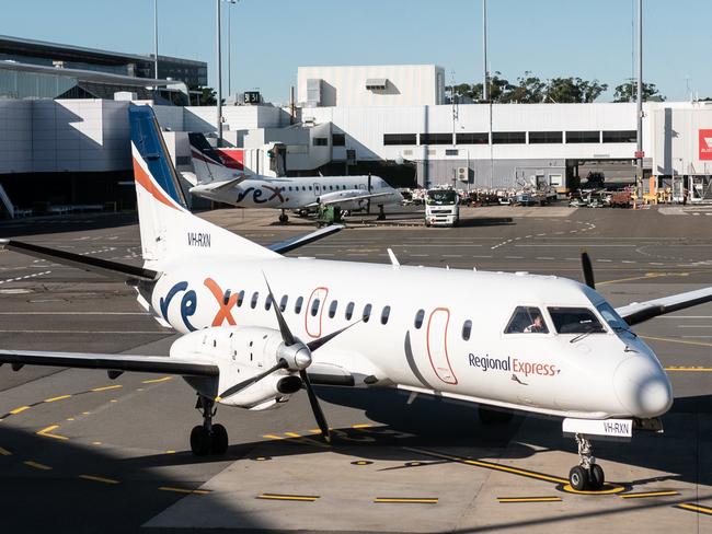 Regional Express (Rex) aircraft on the tarmac at Sydney Airport, Sydney, Friday, June 19, 2020. Qantas Group chief executive Alan Joyce says almost 400,000 seats have been sold on Qantas and JetstarÃ¢â¬â¢s domestic networks in the past two weeks, after some state borders opened. (AAP Image/James Gourley) NO ARCHIVING