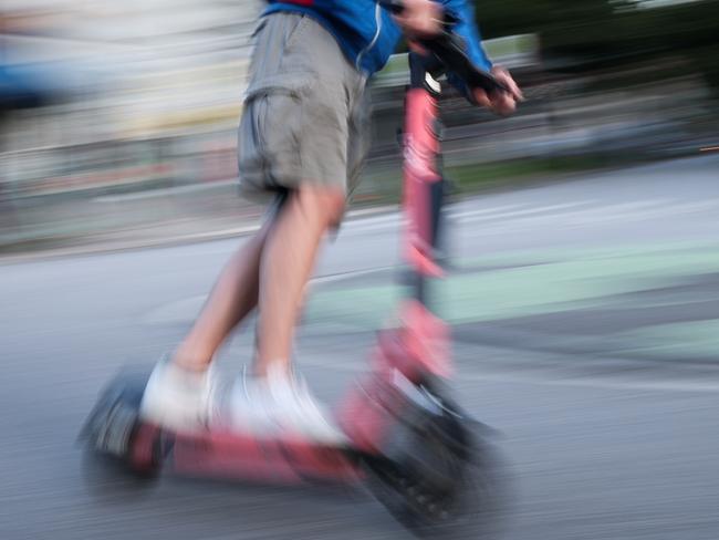 PRODUCTION - 28 July 2024, Berlin: A man is riding an e-scooter in Hamburg (shot with long shutter speed). The German government is planning new rules for e-scooters. Photo: Christian Charisius/dpa (Photo by Christian Charisius/picture alliance via Getty Images)