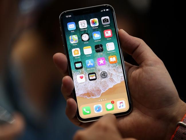 CUPERTINO, CA - SEPTEMBER 12: The new iPhone X is displayed during an Apple special event at the Steve Jobs Theatre on the Apple Park campus on September 12, 2017 in Cupertino, California. Apple held their first special event at the new Apple Park campus where they announced the new iPhone 8, iPhone X and the Apple Watch Series 3. Justin Sullivan/Getty Images/AFP == FOR NEWSPAPERS, INTERNET, TELCOS & TELEVISION USE ONLY ==