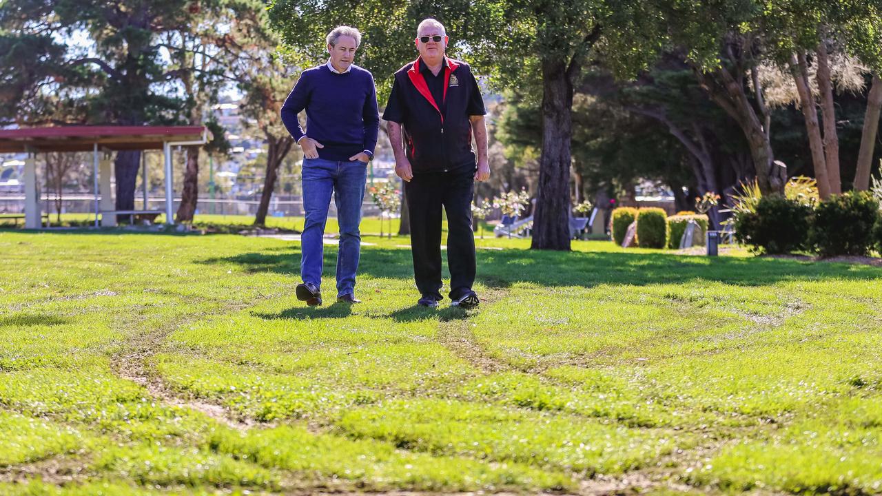 Clarence Mayor, Brendan Bromeley and President of the Lindisfarne RSL Sub branch Chris Parker survey the damage left to Anzac Park. Picture: Linda Higginson