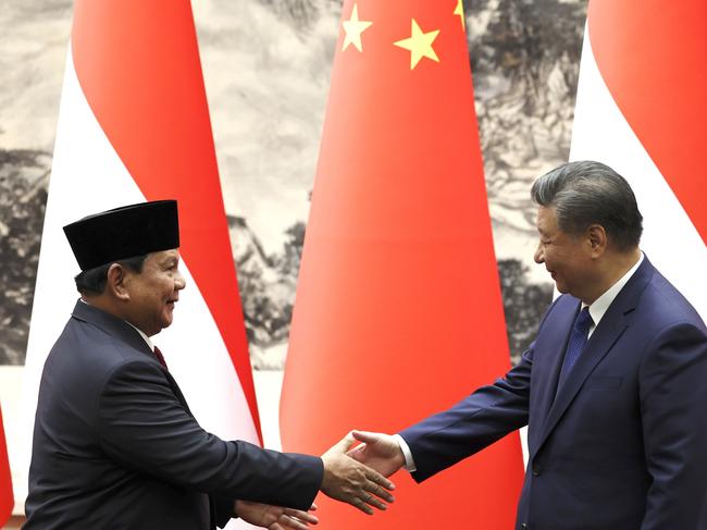 BEIJING, CHINA - NOVEMBER 9: Chinese President Xi Jinping and Indonesian President Prabowo Subianto shake hands during a signing ceremony at the Great Hall of the People on November 9, 2024 in Beijing, China. (Photo by  Florence Lo - Pool/Getty Images)