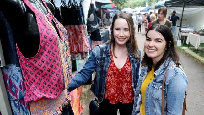 Fiona Chamberlain from Brisbane looks over a clothing stall with Katherine Robertson from Redlynch at the Tanks Markets. PICTURE: STEWART MCLEAN