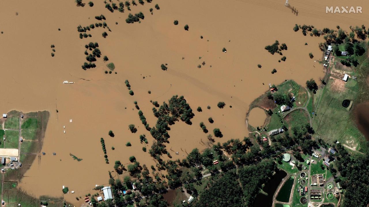 The same area photographed after the floods. Picture: Satellite image ©2021 Maxar Technologies / AFP)