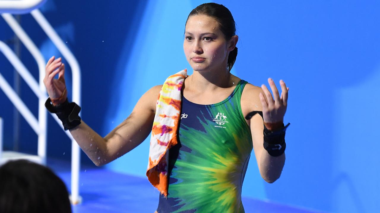 Melissa Wu reacting after she won gold in the 10m platform.