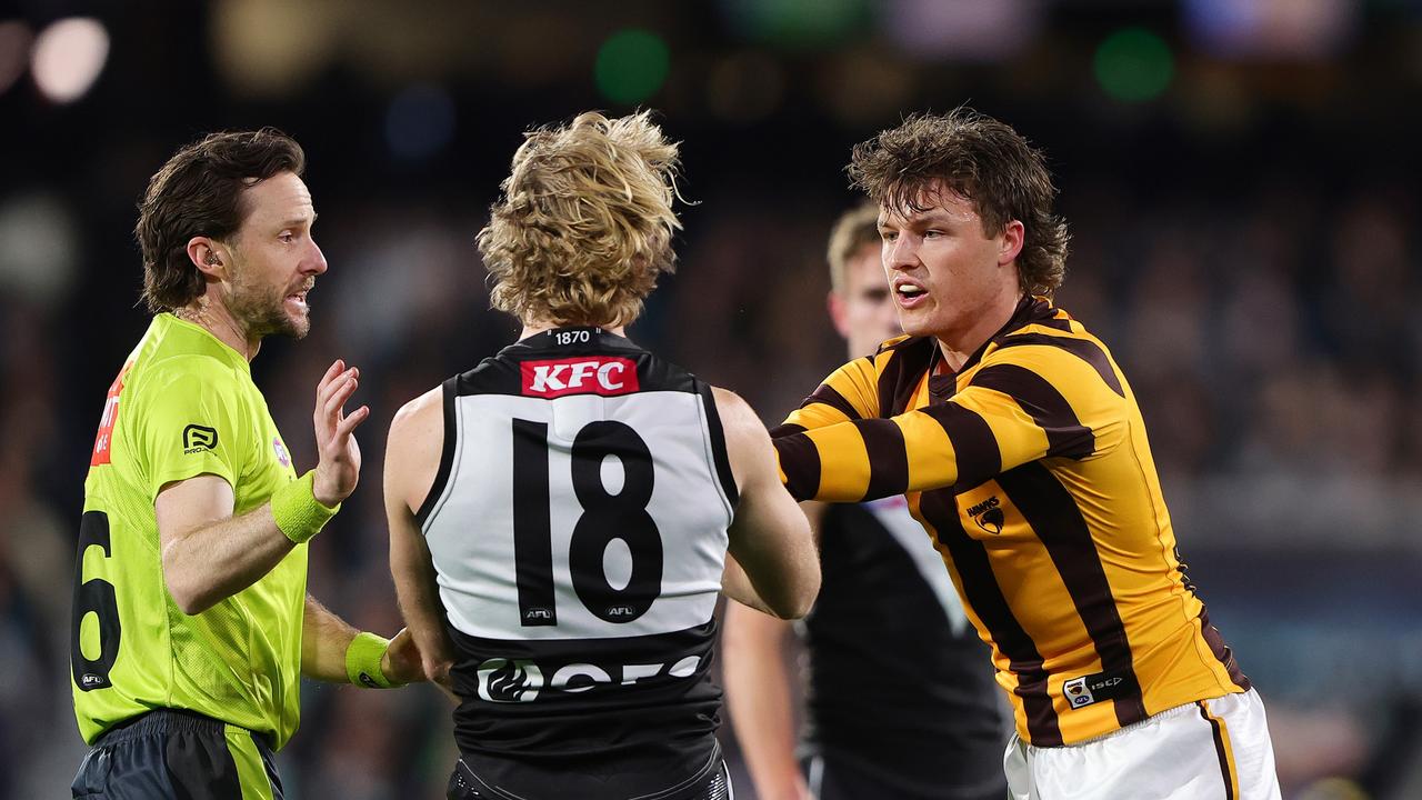 Tempers Flare between Jason Horne-Francis of the Power and Jack Ginnivan of the Hawks during the 2024 AFL Second Semi Final match between the Port Adelaide Power and the Hawthorn Hawks. (Photo by Sarah Reed/AFL Photos via Getty Images)