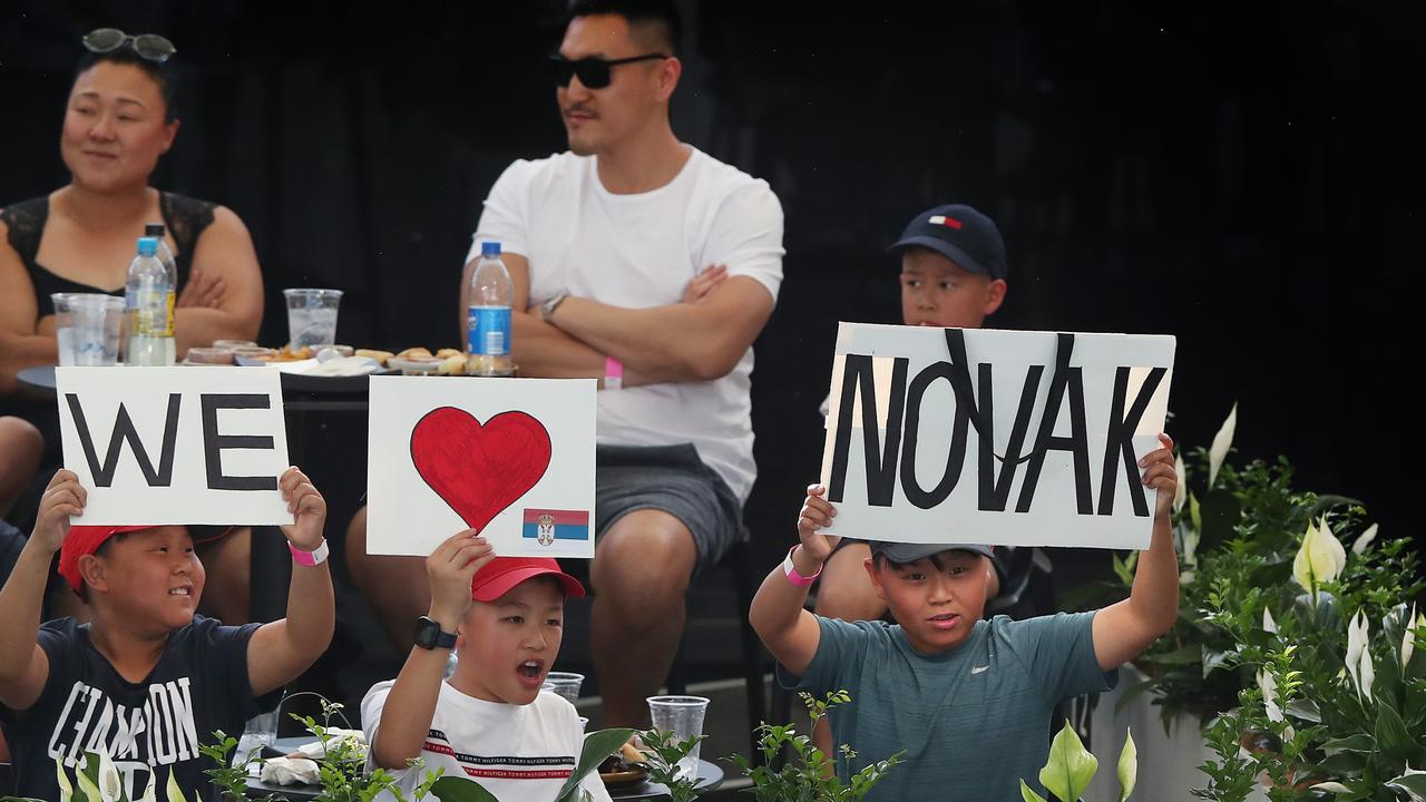 Fans show their love for Djokovic. Picture: Sarah Reed/Getty Images