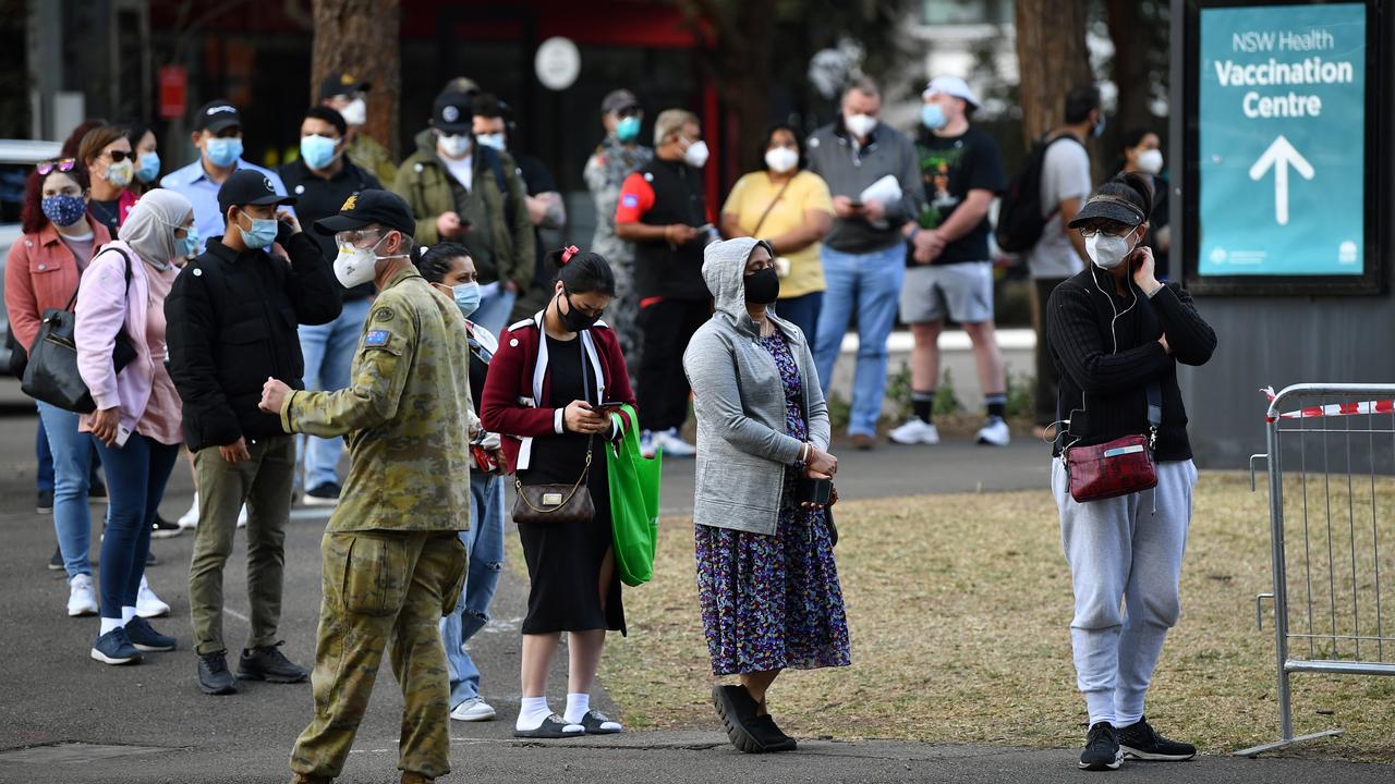 There have been long queues across vaccination hubs in Sydney, with some lining up for hours. Picture: NCA NewsWire/Joel Carrett