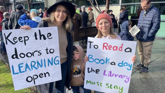 Geelong West mum Kristen with kids Hailey, 9 (right) and Parker, 3 (centre) at the Geelong West library rally.