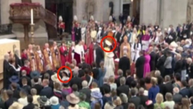 Fans are convinced they saw Meghan (left) turn away from Kate (right) as she made her way into St Paul's cathedral