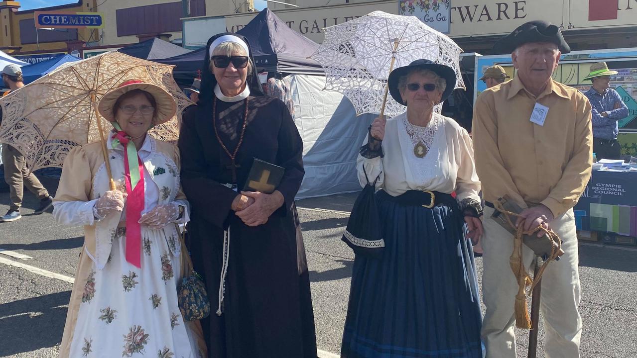 15 crazy outfits from Goomeri Pumpkin Festival 2021: (left to right) Nereda Gfrerer, Di Simpson, Chris Becknamm, John Becknamm - members of the Gympie Historical Re-enactment society, roving around looking for a bushranger to flog.