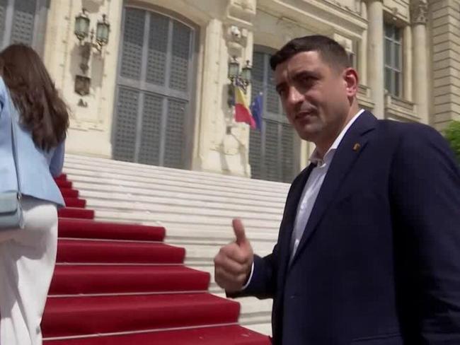 Romanian nationalist Simion scores first-round election win