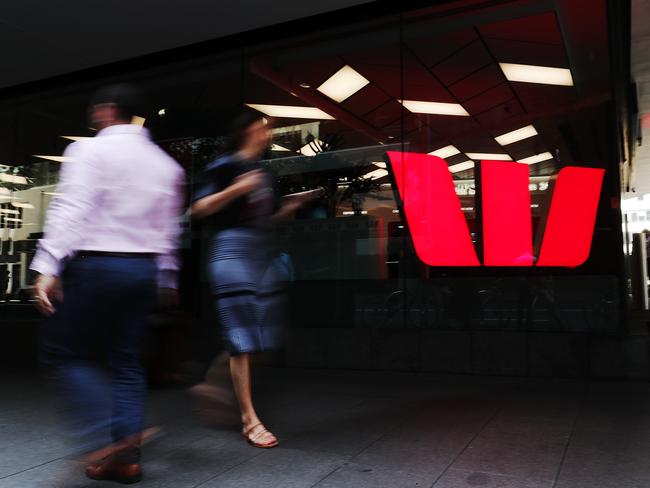 SYDNEY, AUSTRALIA - NOVEMBER 26: Pedestrians walk past a Westpac bank on November 26, 2019 in Sydney, Australia. Westpac has announced that chief executive Brian Hartzer will step down and chairman Lindsay Maxsted will leave the board early following the launch of an investigation by Australia's financial intelligence agency - AUSTRAC - over a money laundering and child exploitation scandal. AUSTRAC alleges the bank breached anti-money laundering laws 23 million times, including failing to adequately vet thousands of payments potentially linked to child exploitation. (Photo by Mark Metcalfe/Getty Images)